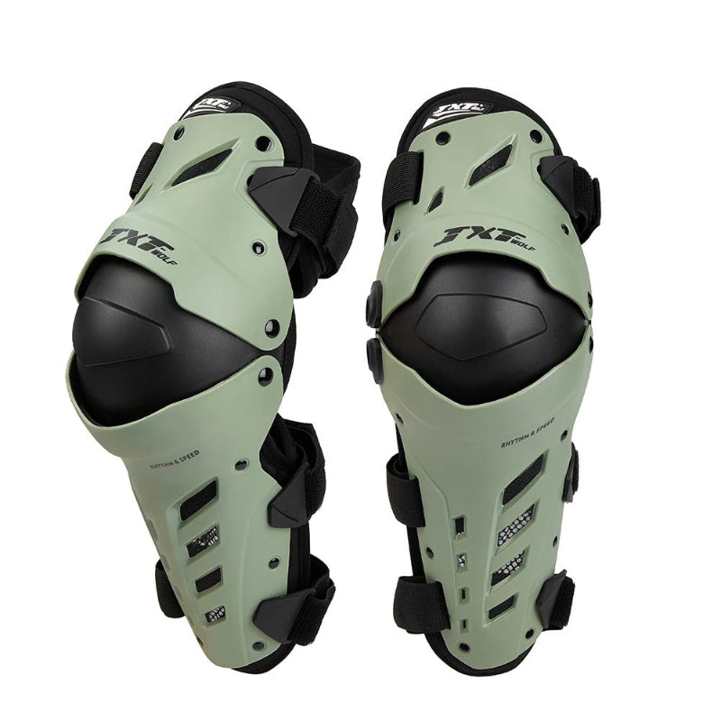 Pair of green and black knee pads on a white background