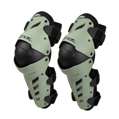 Pair of green and black knee pads on a white background