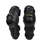 Pair of black knee guards with 'FXF' branding on a white background