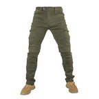 Green motorcycle pants with knee pads and shoes on a white background