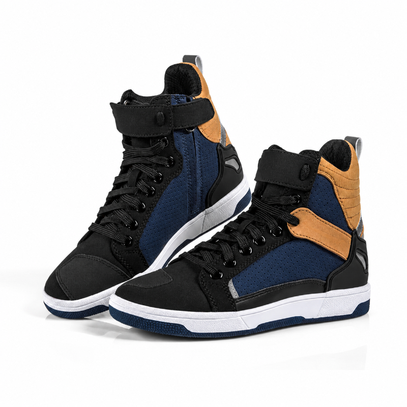 A pair of high-top sneakers in black, navy blue, and tan. The shoes feature a black upper with navy blue panels, tan leather accents on the heel, a black hook-and-loop strap across the ankle, a white midsole, and a navy blue outsole.