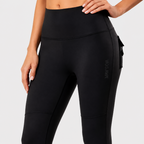 Black high-waisted leggings with a side cargo pocket , shown on a model against a light gray background.