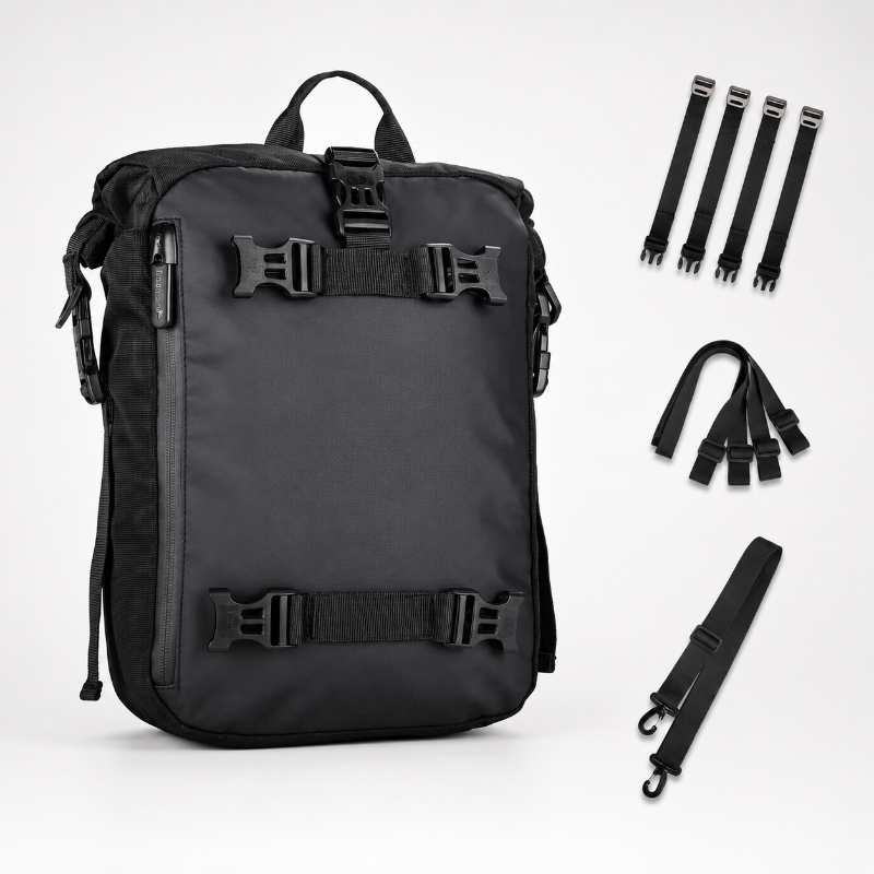 A black backpack shown on a light gray studio background with several black strap accessories arranged to the right. The backpack has multiple buckle straps and a top handle, and the accessories appear included with the product.