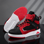 A pair of high-top sneakers in black and red with white soles, displayed on a reflective dark surface against a gray background. One shoe is shown from the side, and the other is turned to show the outsole.