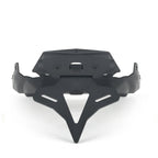 Black plastic license plate frame for BMW F900R 2020-Up motorcycle, shown without LED lights, on a white background with text overlay.