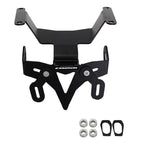 Black metal license plate frame with mounting hardware, including four silver nuts and two black rubber gaskets, shown on a plain white background.