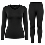 A women's two-piece athletic set consisting of a black long-sleeve crewneck top and matching black full-length leggings, displayed on a clean white background.