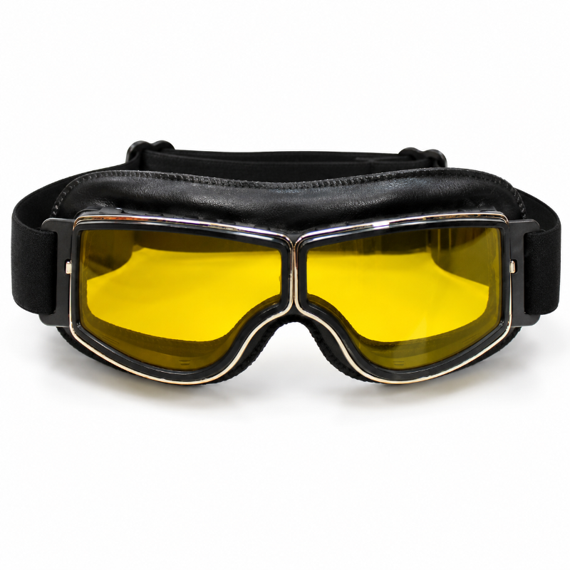 Black aviator-style goggles with a padded strap and large yellow-tinted lenses, shown on a plain white background.