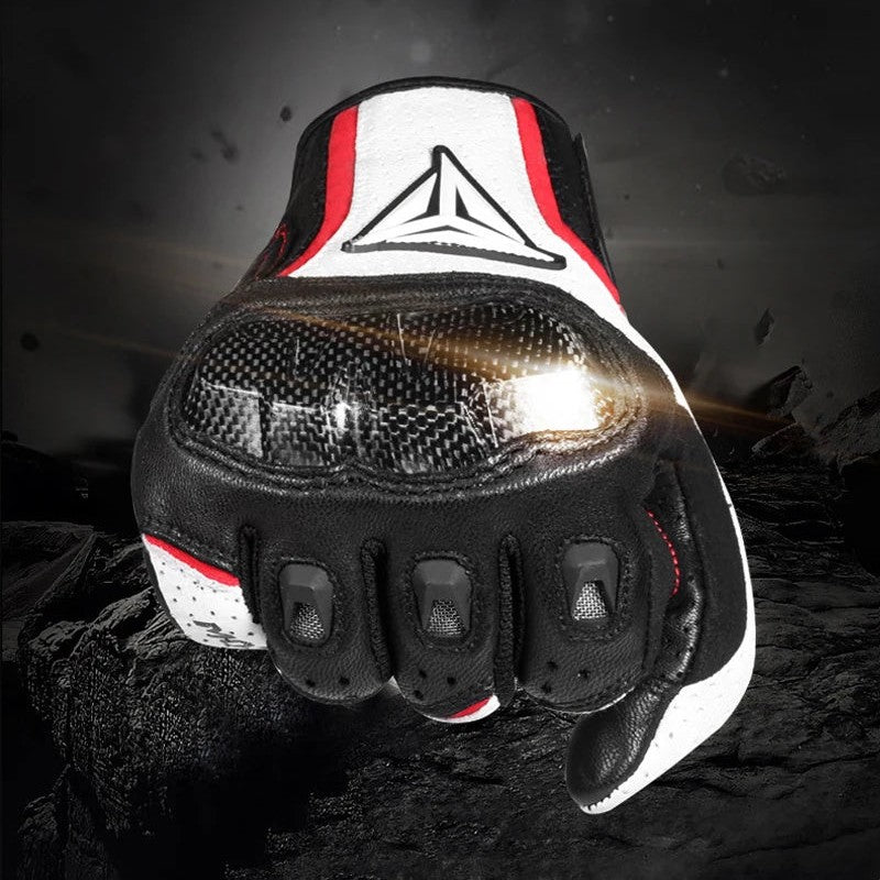 A single motorcycle glove shown in a dramatic close-up. The glove is primarily black with white panels and red trim, featuring a large triangular logo on the back.